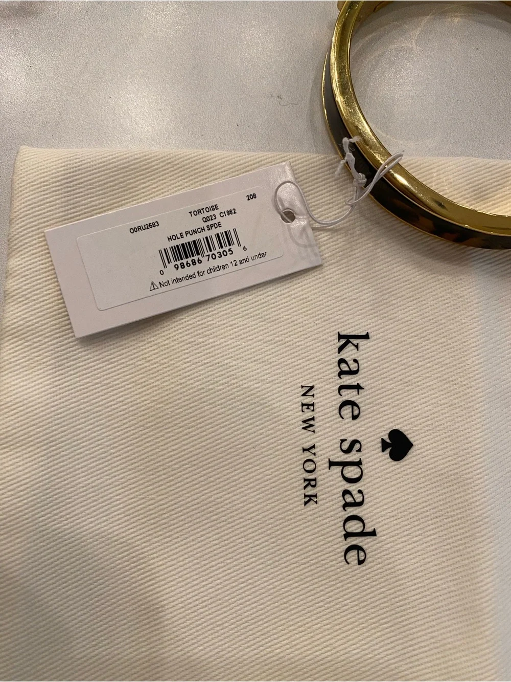 KATE SPADE Tortoise Inlaid Hole Punch Spade Hinged Bracelet
